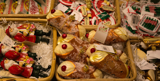 Of course, Italy would have baskets of food ornaments. If only that cannoli were real...